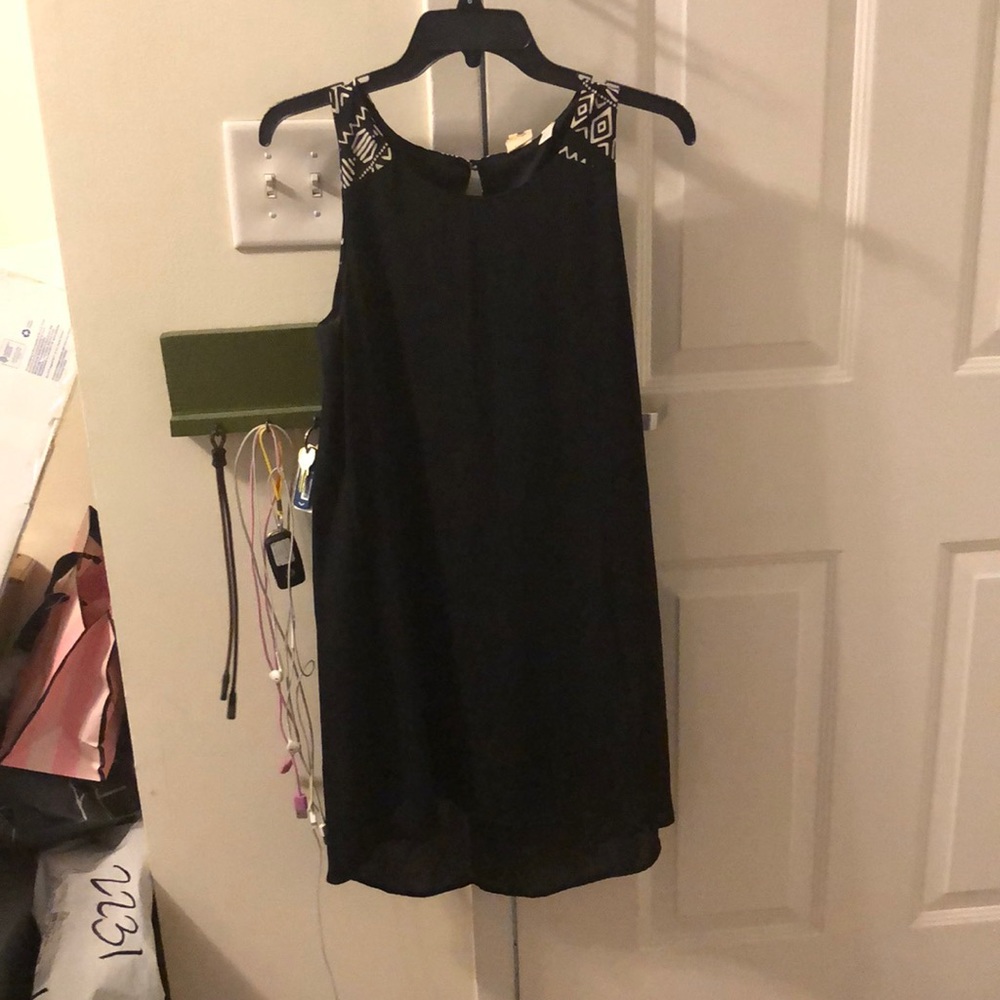 Black dress with white geometric pattern